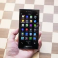 A black BlackBerry Leap smartphone, featuring a minimalist design with a touchscreen display and BlackBerry logo at the bottom.