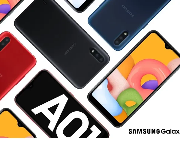 A sleek black Samsung Galaxy A01 smartphone against a vibrant background.