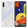 A sleek Samsung Galaxy A50s smartphone lying on a white surface with a vibrant display.