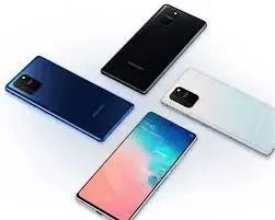 A sleek smartphone resting on a reflective surface, displaying its vibrant screen and camera module.