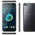 HTC Desire 12+ smartphone, black color, front view, showcasing the large 6-inch display and dual rear cameras.