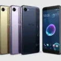 HTC Desire 12 smartphone, black color, front view, showcasing the large 6-inch display and dual rear cameras.